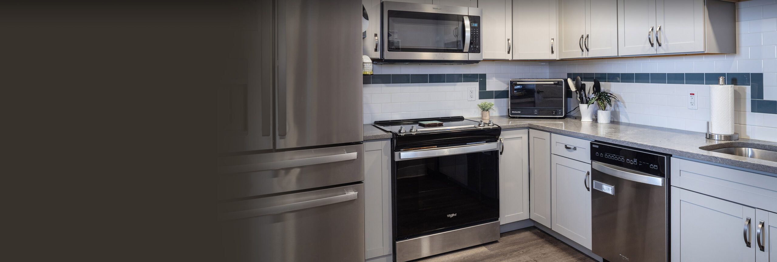 Half the image is of the kitchen at pappus house and the other half is a brown blur.